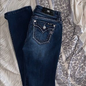 Bootcut dark wash miss me jeans. Size 27.